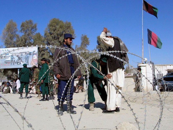 Security personnel frisking a man in the southern border town of Spin Boldak, near the Pakistani border. (Photo Credit - Reuters)