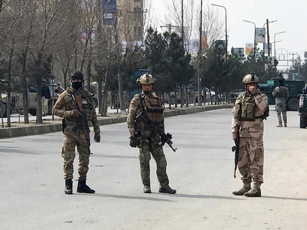 Afghan security forces near the site of the attack in Kabul on Friday