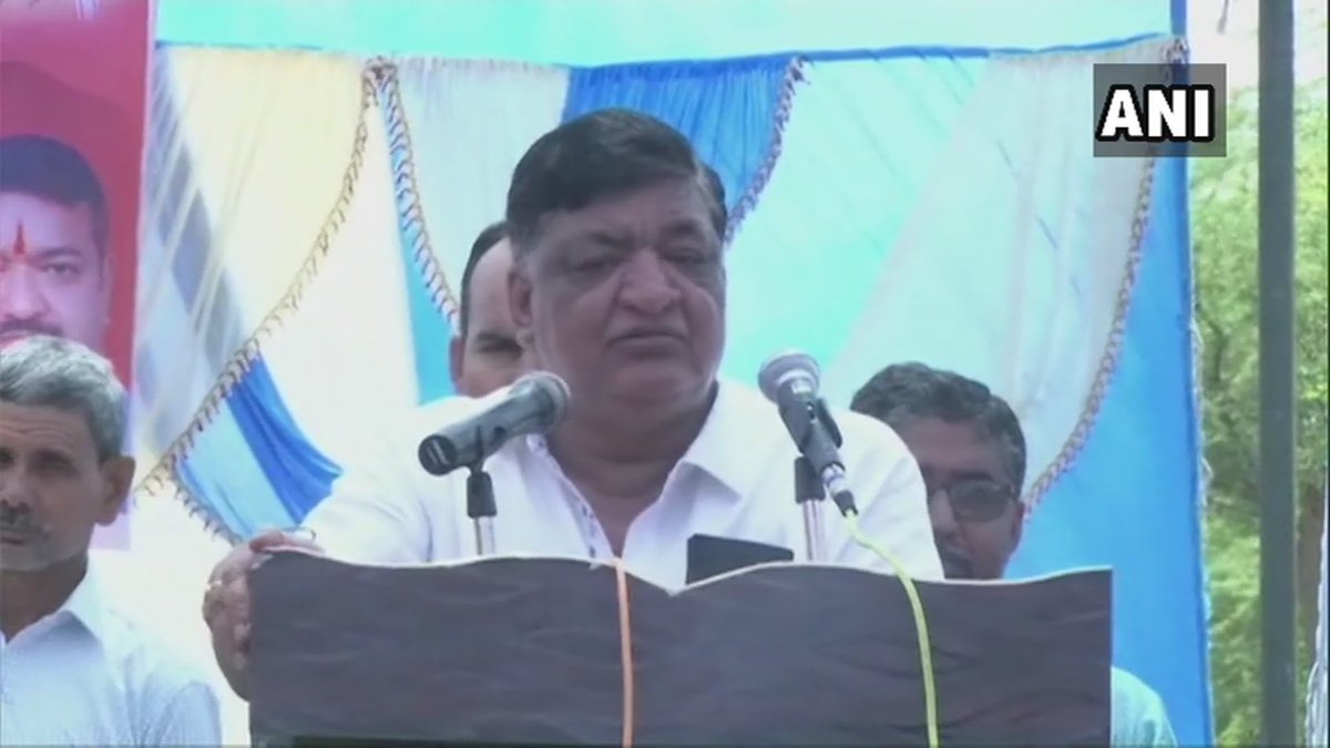 BJP leader Naresh Agarwal addressing a rally in Hardoi, Uttar Pradesh on Friday.
