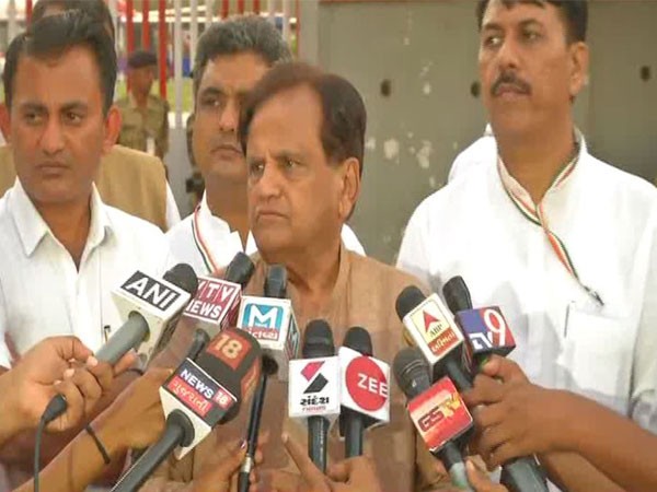 Senior Congress leader Ahmed Patel speaks to reporters in Gandhinagar on Tuesday.