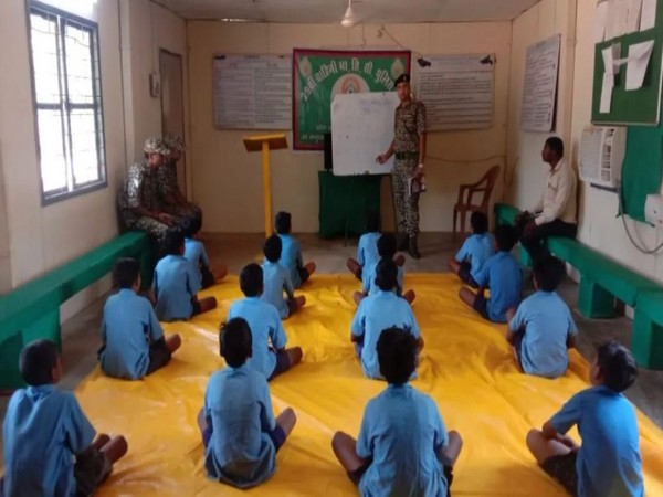 ITBP personnel coaching students of remote Chhattisgarh schools (Photo/ANI)
