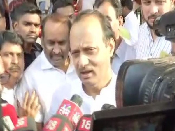 NCP leader Ajit Pawar speaking to reporters in Mumbai on Saturday.