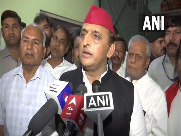 Samajwadi Party chief Akhilesh Yadav speaking to reporters on Sunday. 