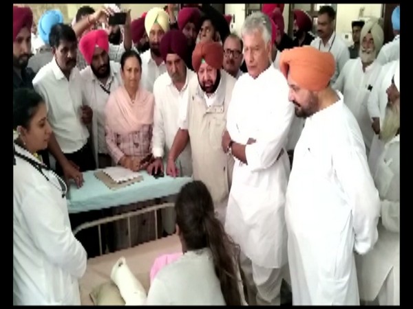 Punjab Chief Minister Captain Amarinder Singh meets people, who were injured in fire that broke out in fire-crackers factory in Batala
