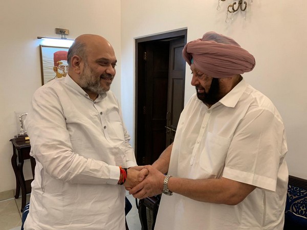 Union Home Minister Amit Shah meets Punjab Chief Minister Captain Amarinder Singh in New Delhi on Thursday. Photo/ANI