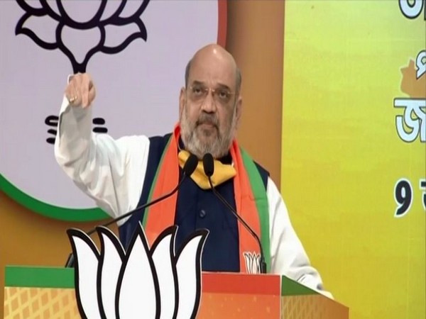 Union Home Minister and BJP leader Amit Shah speaking at the West Bengal Jan Samvad Rally on Tuesday. (Photo/ANI)