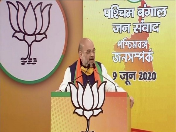 Union Home Minister and BJP leader Amit Shah speaking at the West Bengal Jan Samvad Rally on Tuesday. (Photo/ANI)