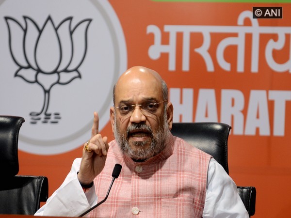BJP president Amit Shah addresses a press conference at party headquarters in New Delhi on Friday [Photo/ANI]