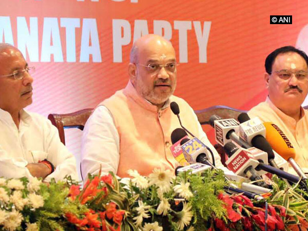 BJP president Amit Shah at a press conference in Varanasi on Tuesday. Photo/ANI