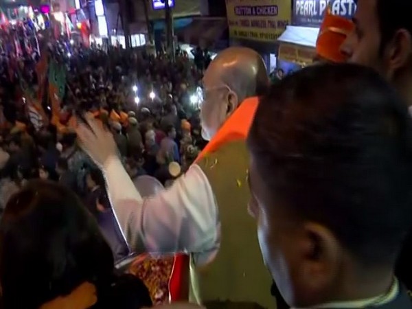 Union Home Minister Amit Shah holding roadshow in Paharganj on Monday Photo/ANI