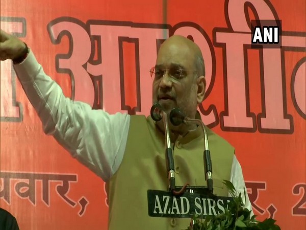 Home Minister Amit Shah speaking at a public rally in Rohtak on Wednesday.