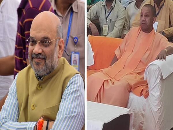 Amit Shah (L) and Yogi Adityanath (R) listen to Mann Ki Baat 