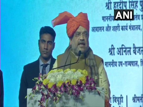 Home Minister Amit Shah addressing an event in Delhi on Monday. =