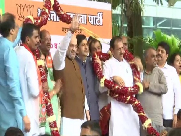 Home Minister Amit Shah welcomed by BJP workers at the Mumbai Airport on his arrival on Monday. Photo/ANI