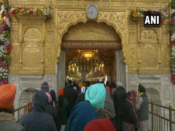 People offer prayers at the Golden Temple on the occasion of Prakash Purab.