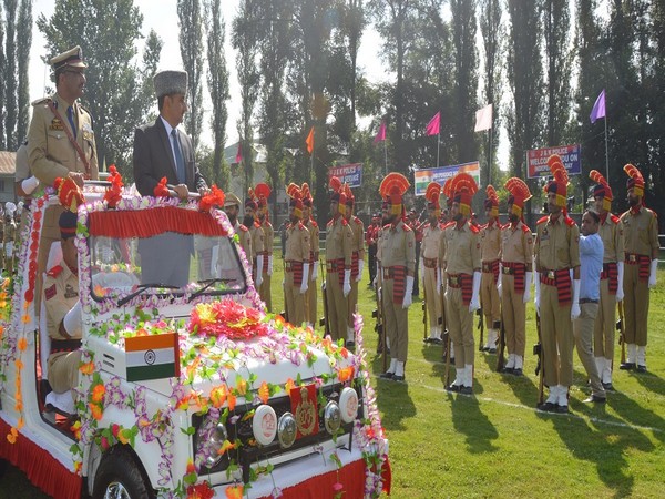 Deputy Commissioner Khalid Jahangir taking salute at the Independence day parade in Anantnag. Photo/ANI