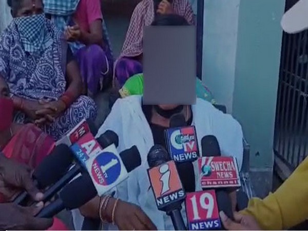 The woman speaking to media on Thursday. 