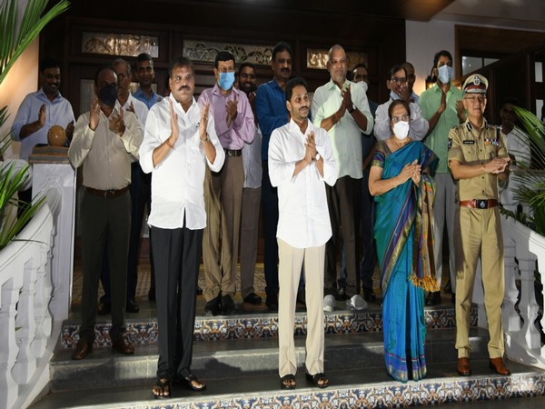 Andhra Pradesh Chief Minister YS Jagan Mohan Reddy clapping to appreciate village volunteers on Friday. Photo/ANI