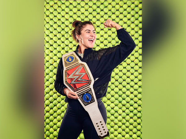 Bianca Andreescu with a customised WWE Championship title
