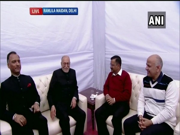 Delhi Lieutenant Governor Anil Baijal shares stage with Kejriwal and AAP leader Manish Sisodia.  (Photo/ANI)