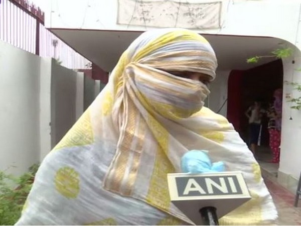 Anjali Dubey, wife of Vikas Dubey's brother Prakash Dubey speaking to ANI in Lucknow on Sunday. (Photo/ANI)