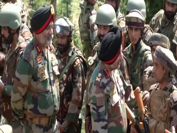 Northern Army Commander Lt Gen Ranbir Singh accompanied by Lt Gen KJS Dhillon interacting with troops in Kupwara on  Thursday. (Photo/ANI)