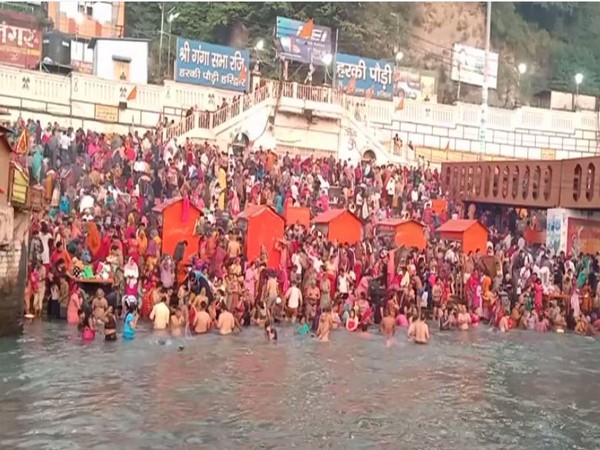 Thousands of devotees took dip in river Ganga at Har Ki Pauri Ghat on Tuesday  [Photo/ANI]