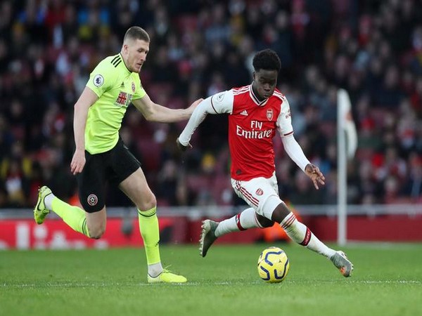  Arsenal's Bukayo Saka in action with Sheffield United's John Lundstram