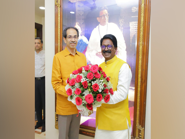 Mahrashtra CM Uddhav Thackeray with Shiv Sena leader Arvind Sawant on Friday. Photo/ANI