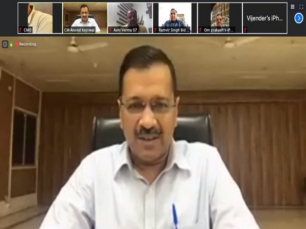 Delhi Chief Minister Arvind Kejriwal interacts with MLAs (Picture Courtesy - Twitter)