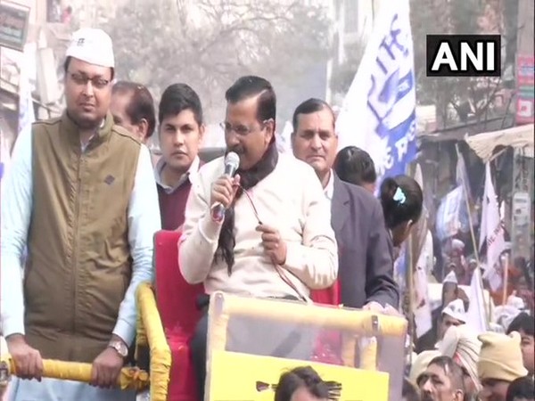 Chief Minister and Aam Aadmi Party (AAP) national convenor Arvind Kejriwal during a roadshow at Kirari.