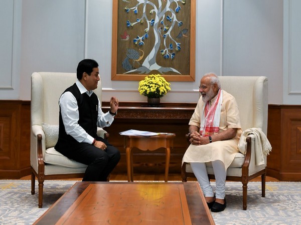 Chief Minister of Assam, Sabanand Sonwal with Prime Minister Narendra Modi on Wednesday in New Delhi. Photo credit: PMO India (Twitter @PMOIndia)