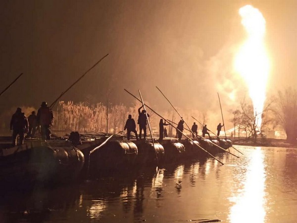 Army constructs composite bridge at blown out Baghjan oil field in Assam. [Photo/ANI]