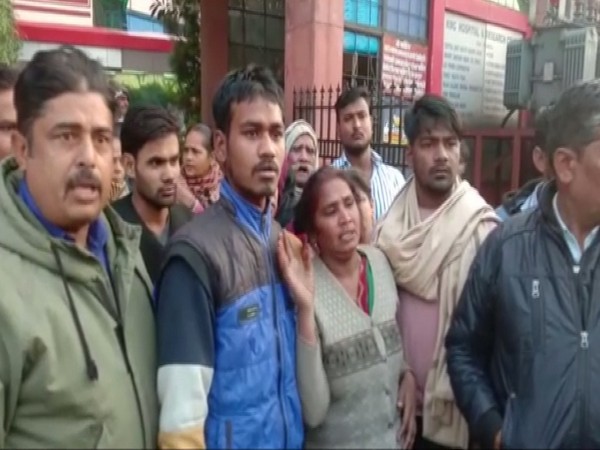 Family members of the auto-driver, along with locals, in Meerut on Sunday. Photo/ANI