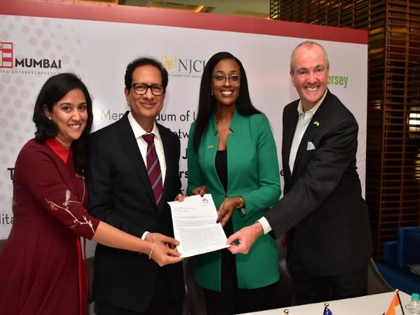 Priyanka Nishar, Atul Nishar, Tamara Cunningham and Governor, Phil Murphy signing the consulting agreement