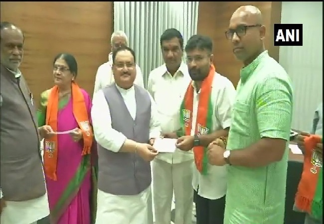 TDP leader Annapurnamma, her son Mallikarjun Reddy joining BJP in New Delhi on Saturday.