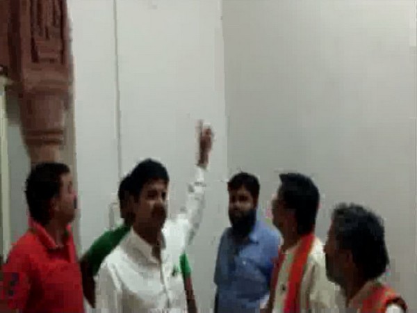 BJP workers at Circuit House in Guna, Madhya Pradesh, on Friday. Photo/ANI