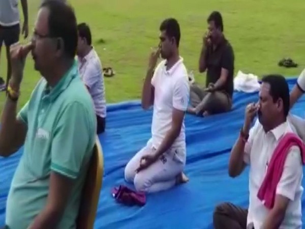 BJP MLAs enjoying yoga session at Ramada Hotel in Bengaluru on Sunday. (Photo/ANI)