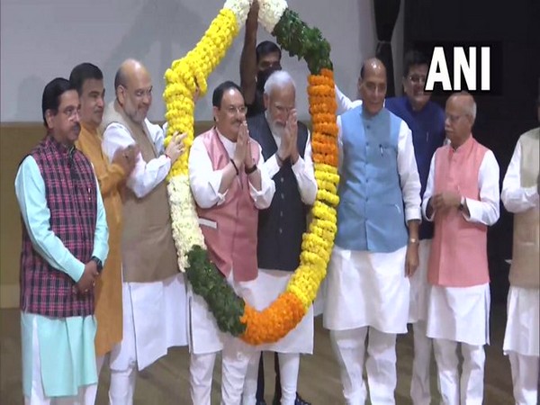 PM Modi and BJP National President JP Nadda garlanded at Parliamentary meeting (Photo/ANI)