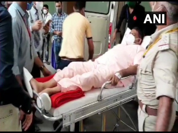 BJP MLA from Matar assembly constituency, Kesarisinh Jesangbhai Solanki arrives in an ambulance to vote in Rajya Sabha Election in Gandhinagar, Gujarat on Friday. (Photo/ANI)
