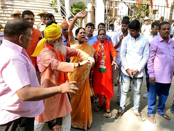 BJP workers celebrate as their party candidate BY Vijayendra, won the 12 out of 15 seats during the counting of votes of Karnataka by-polls, in Bengaluru on Monday. Photo/ANI