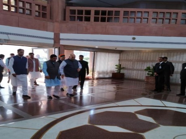BJP leaders Amit Shah, Pralhad Joshi and Arjun Ram Meghwal arrive for the BJP parliamentary party meeting in New Delhi on Tuesday.