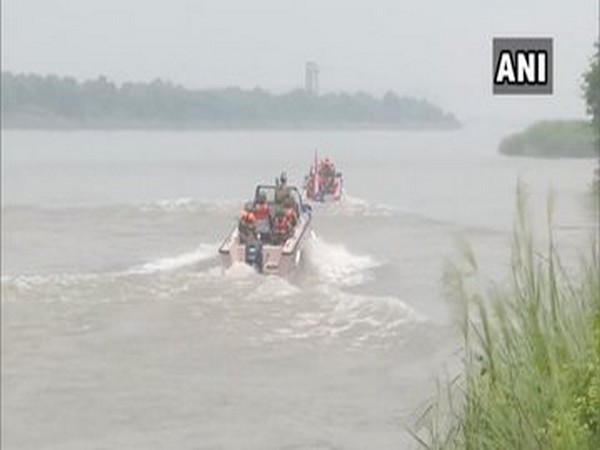 Visuals of BSF boats patrolling on Chenab river.