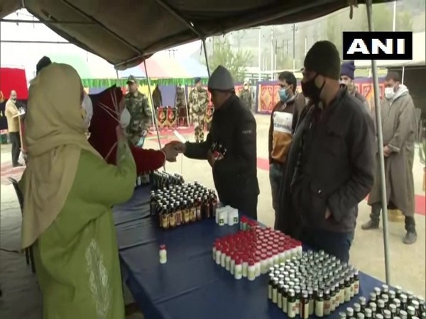 People receive medicines at the camp in Srinagar on Friday. (Photo/ANI)