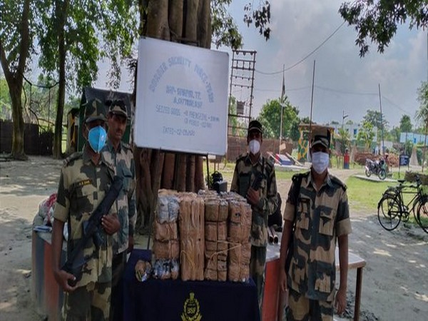 BSF troops seized 1,000 bottles worth Rs 1,69,690 of Phensedyl at Sovapur border outpost in Malda district of West Bengal. [Photo/ANI]