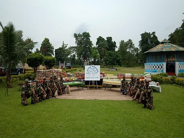 BSF troops with the goods seized from the train in West Bengal. Photo/ANI