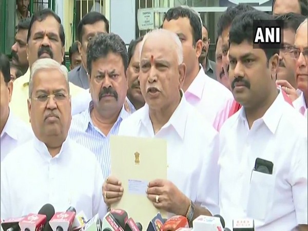 BJP Karnataka chief BS Yeddyurappa speaking to reporters after meeting Governor Vajubhai Vala on Friday in Bengaluru.