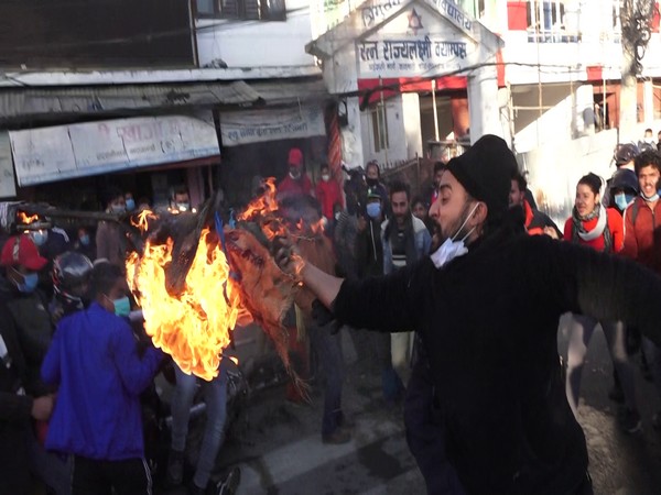 NCP student union burning efigy of PM Oli in Kathmandu om(Photo/ANI)