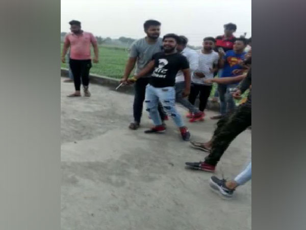 In a viral video, a group of youngsters were seen indulging in celebratory firing in Sarurpur Kherki village. Photo/ANI