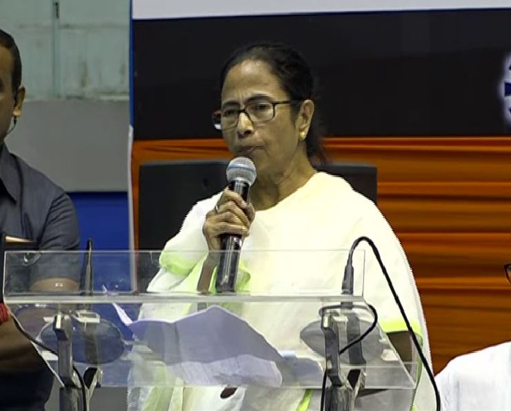 West Bengal CM Mamata Banerjee speaking at an event of INTTUC in Kolkata on Monday. (Photo/ANI)